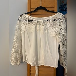 White sleeve cut out shirt